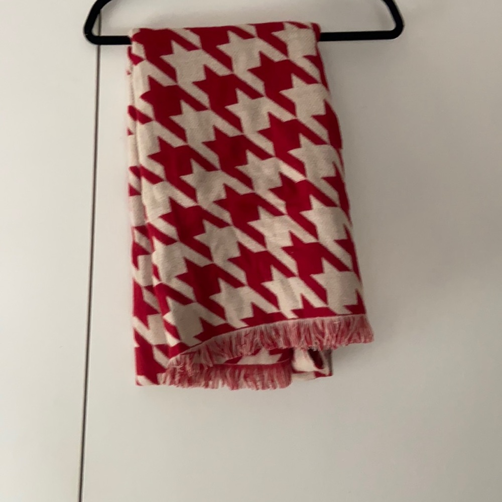red and white patterned blanket scarf